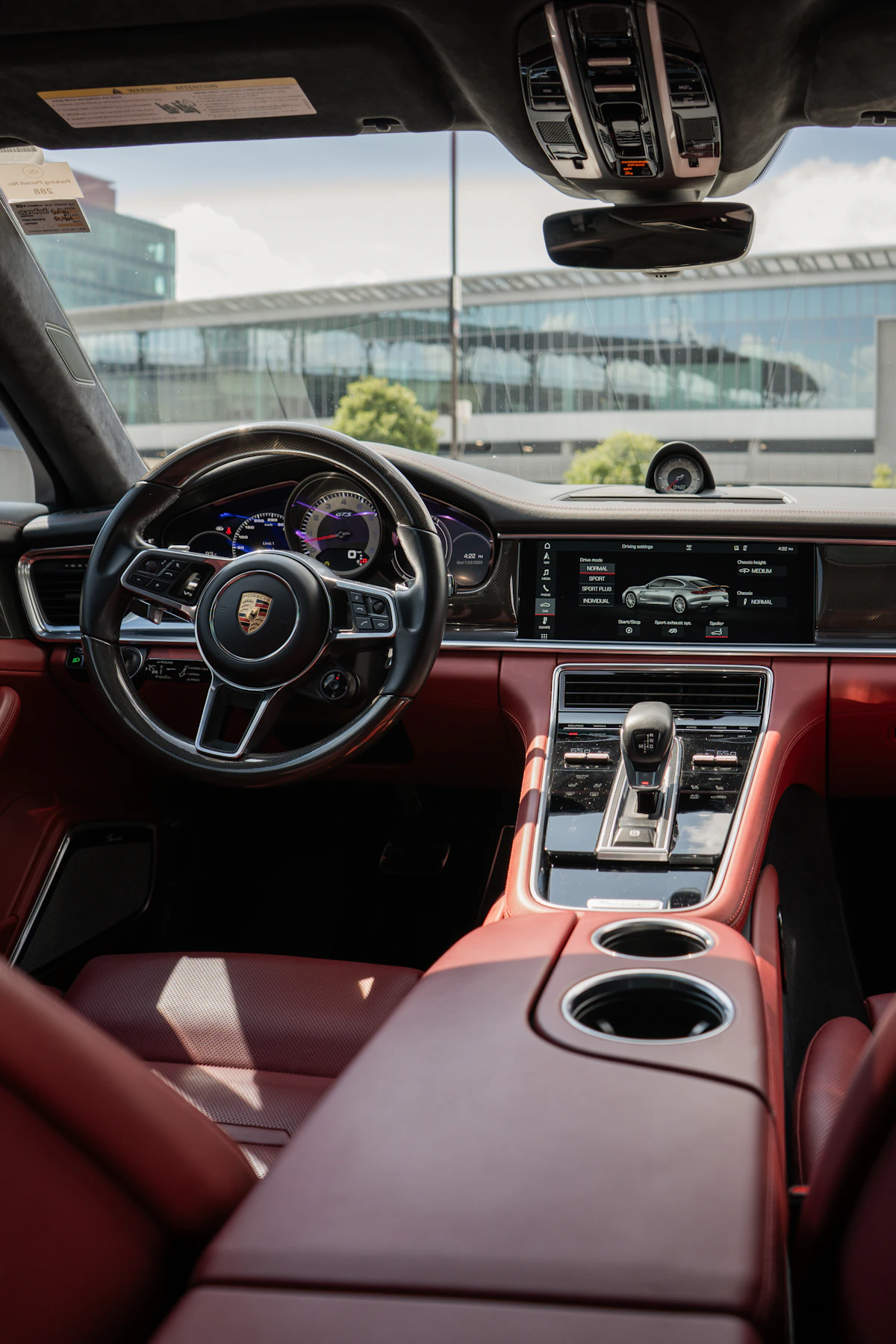 Luxury car interior with digital dashboard, infotainment screen, and center console