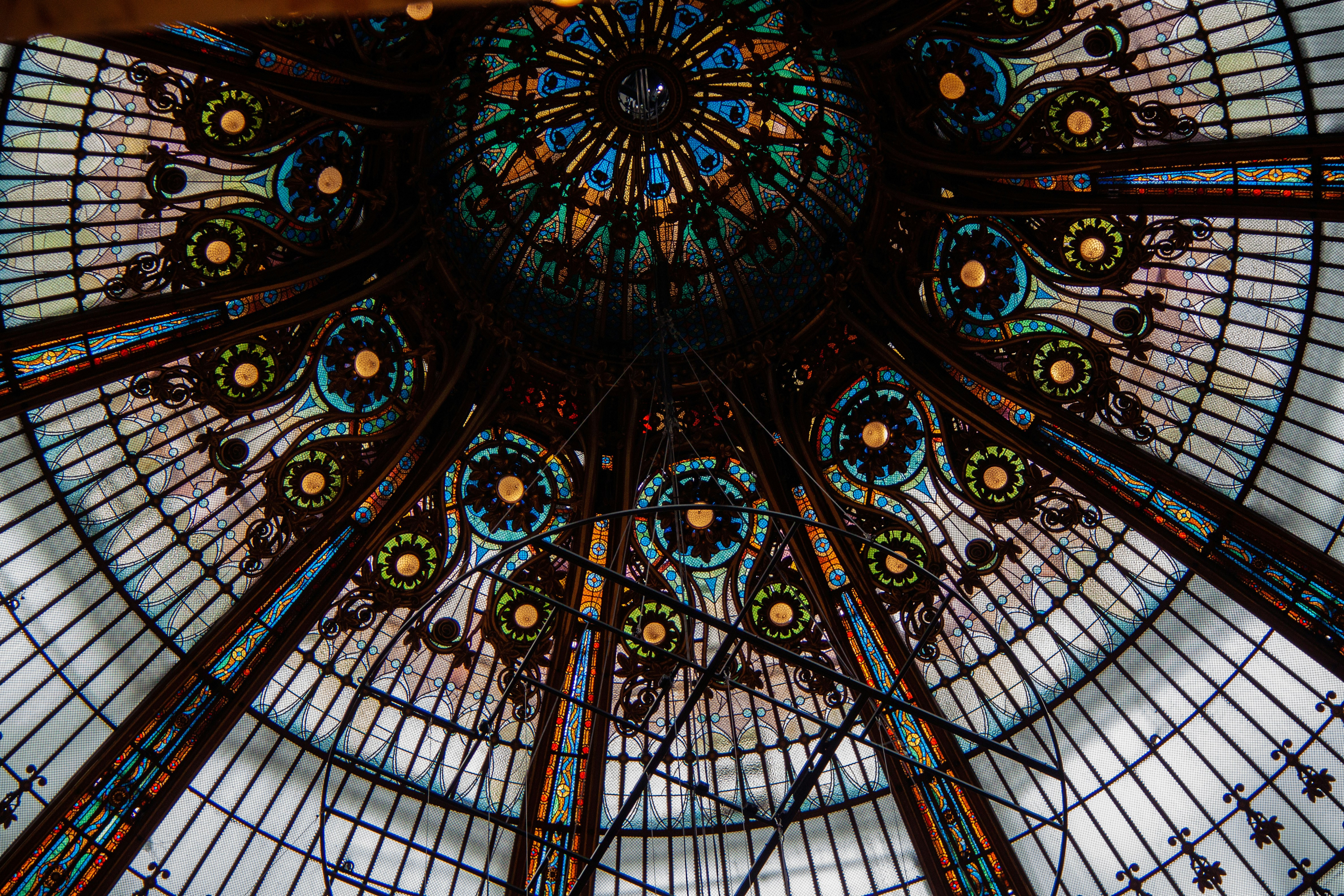 A beautiful stained glass dome ceiling.