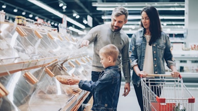 Family is shopping at a grocery store.
