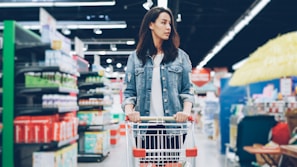 A woman shops in a grocery store.
