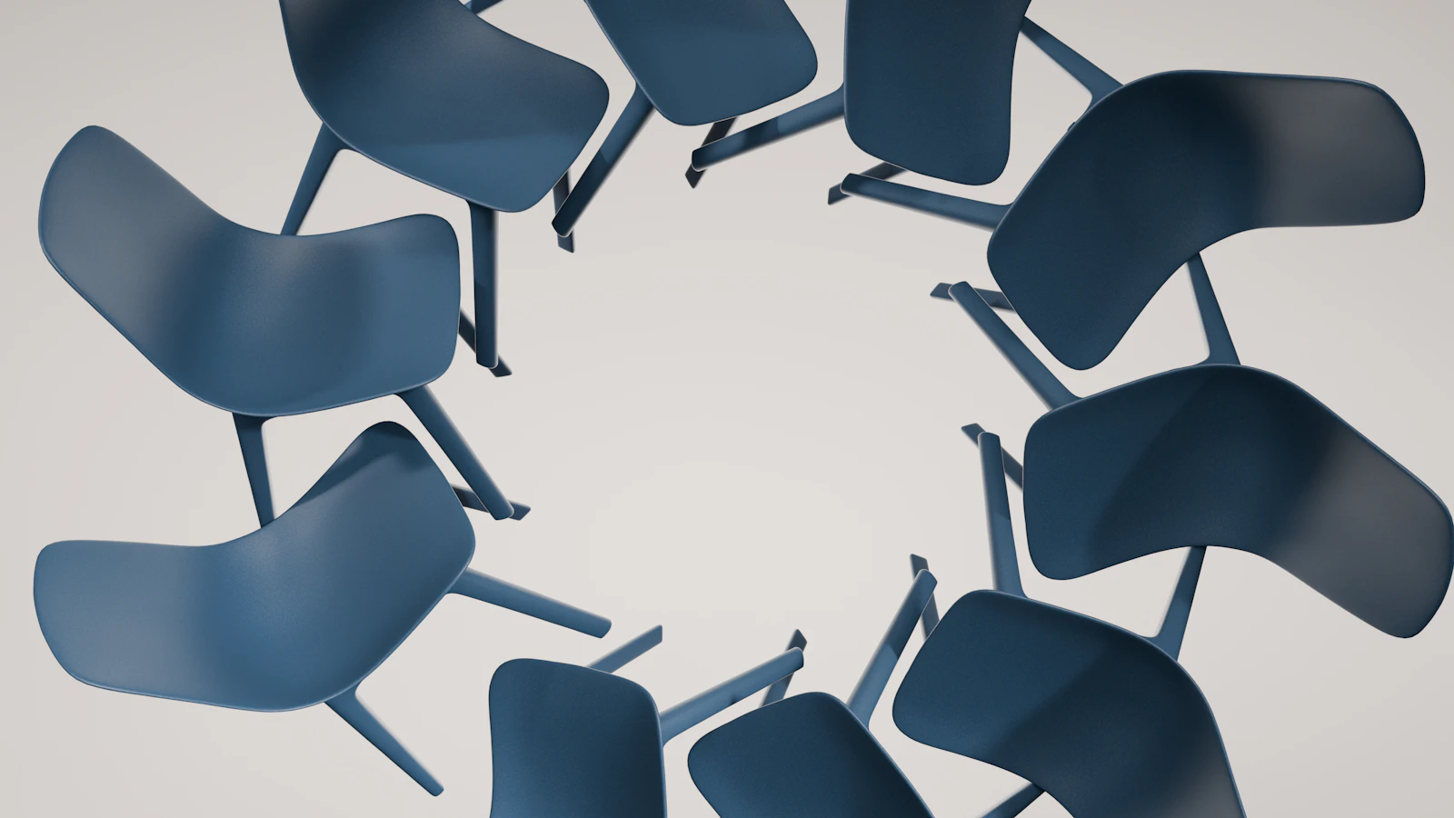 An overhead view of blue chairs arranged in a circle