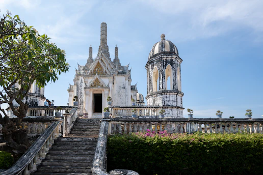 An ornate temple stands tall against a blue sky.