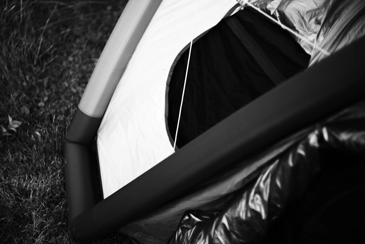 Part of a tent in black and white.