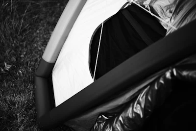 Part of a tent in black and white.