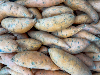 Here's a caption: sweet potatoes, ready for baking!