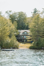 Multi-story year-round waterfront residence with swimming dock on Lake Simcoe, real estate snapshot.