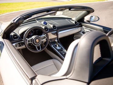 Interior view of a porsche convertible.