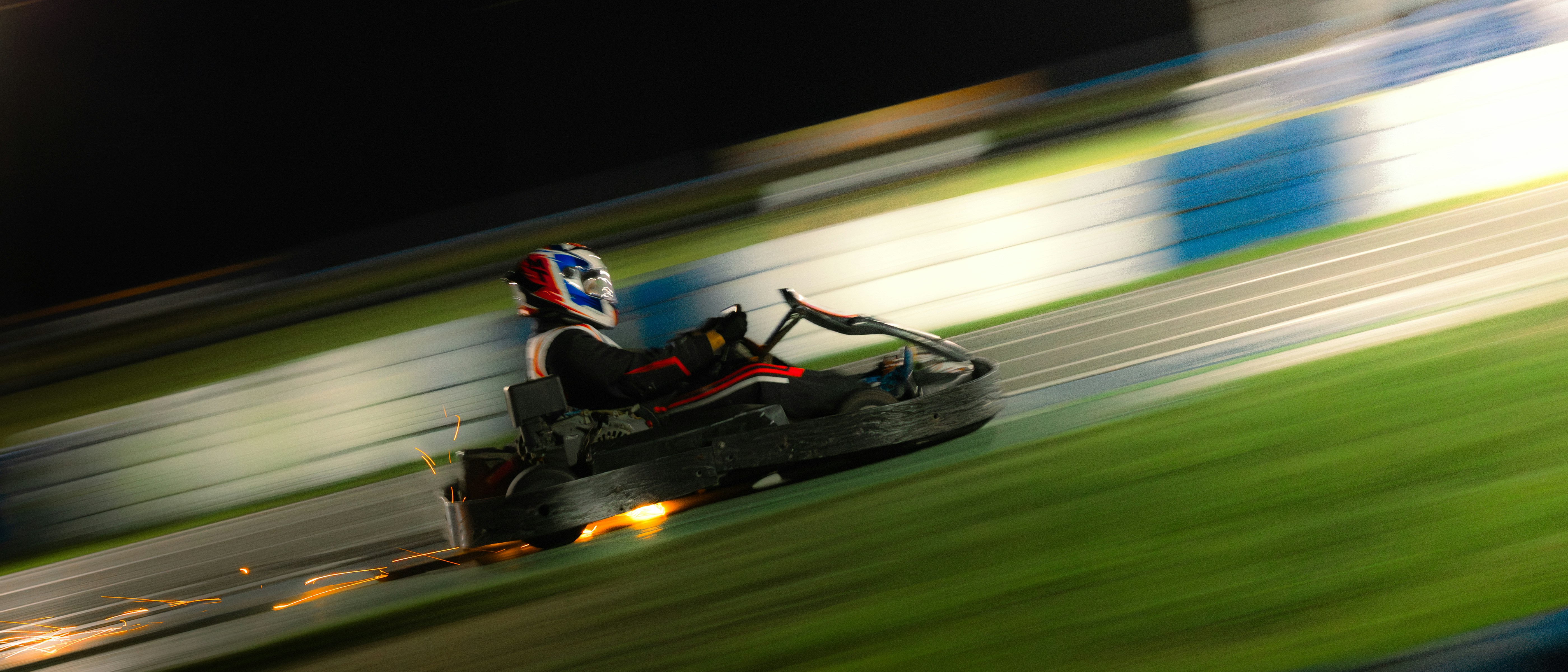 Go-kart racing on the track at night