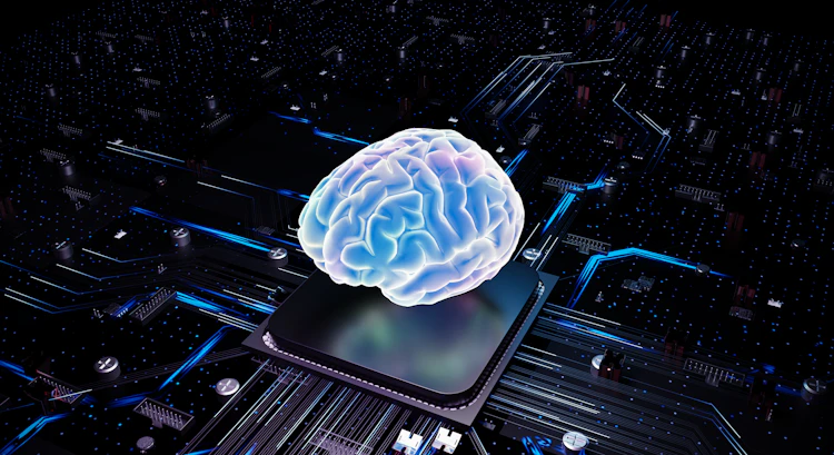 A glowing brain above a processor, representing AI