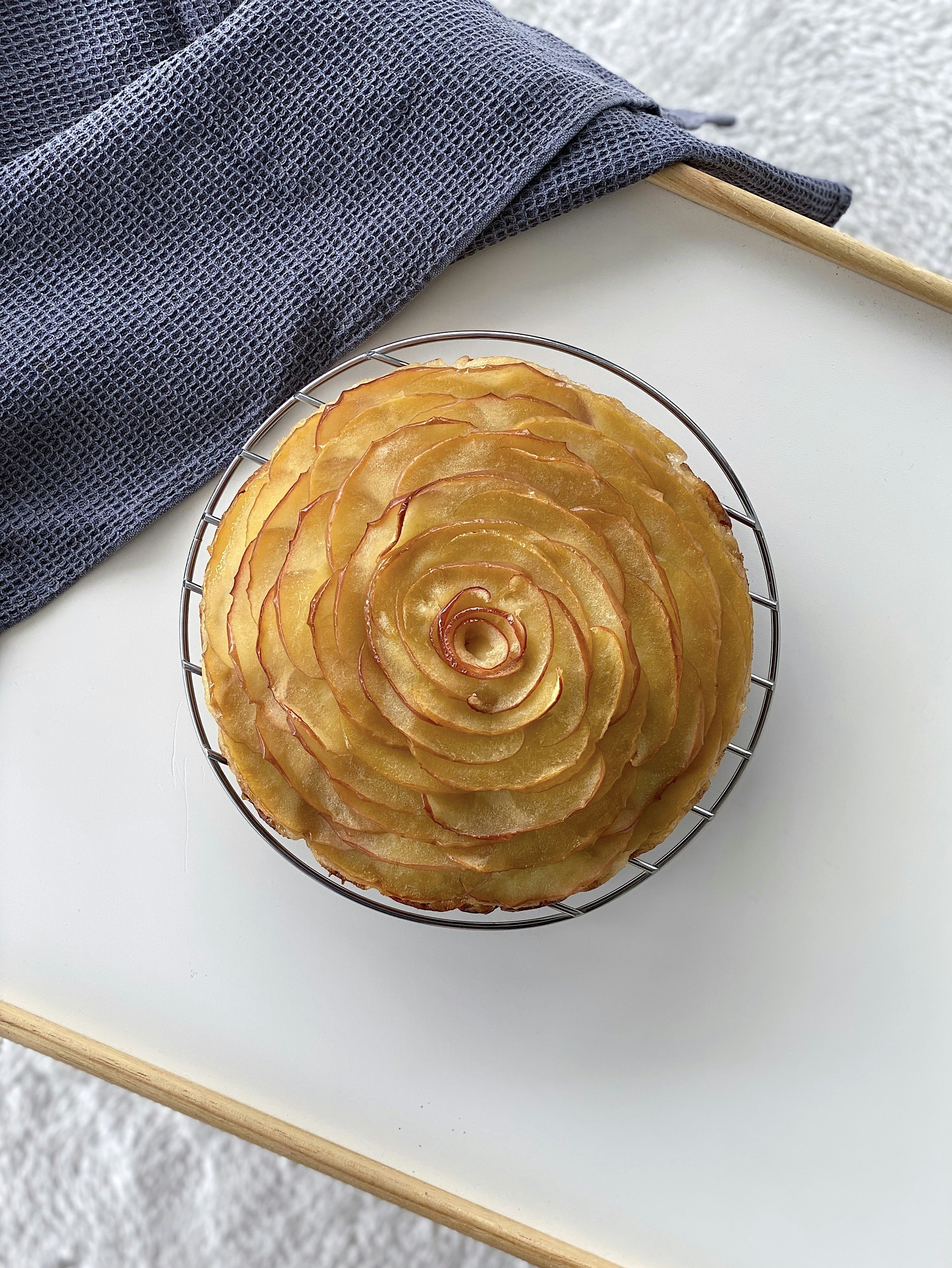 Delicious apple tart on a white tray.