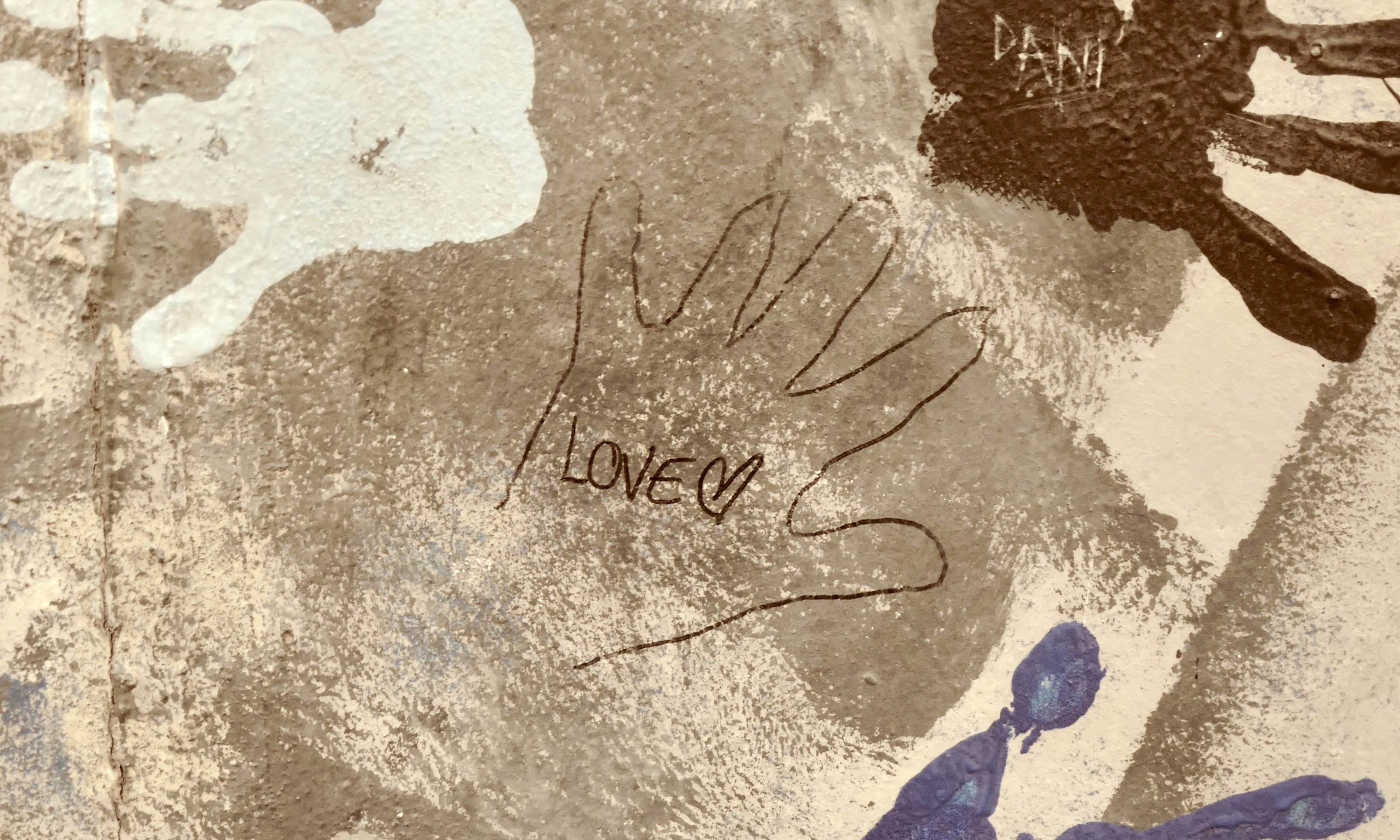 Handprints and a handwritten "love you" message.
