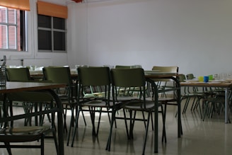 Empty classroom with chairs and tables.