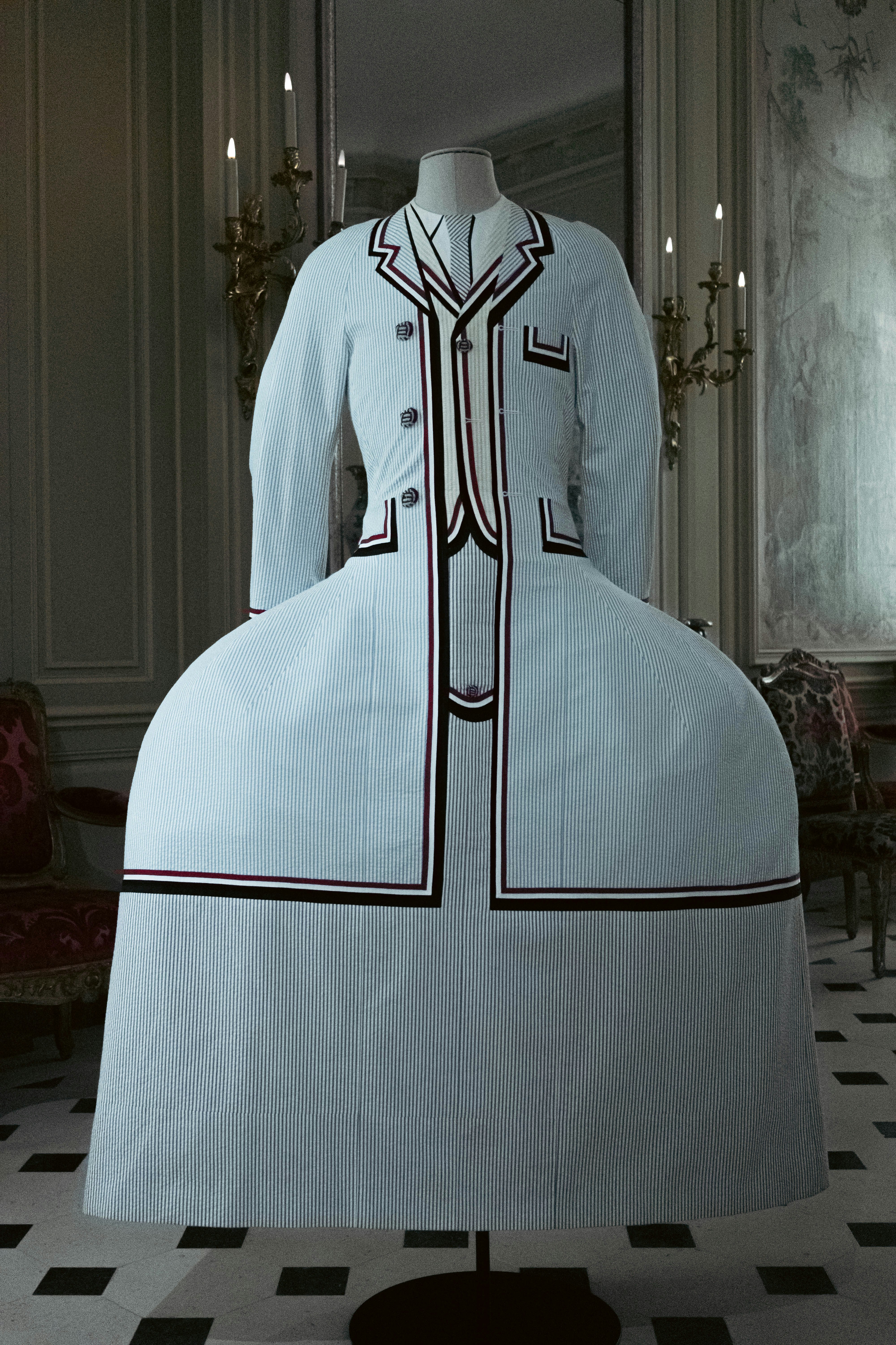 An unusual white dress suit on display.