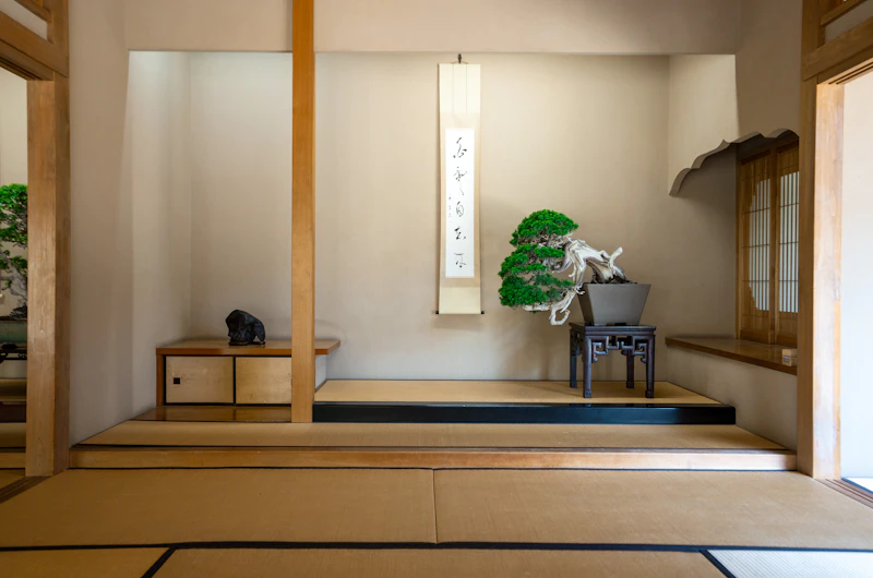 Soft-lit Japanese tatami room with wooden elements