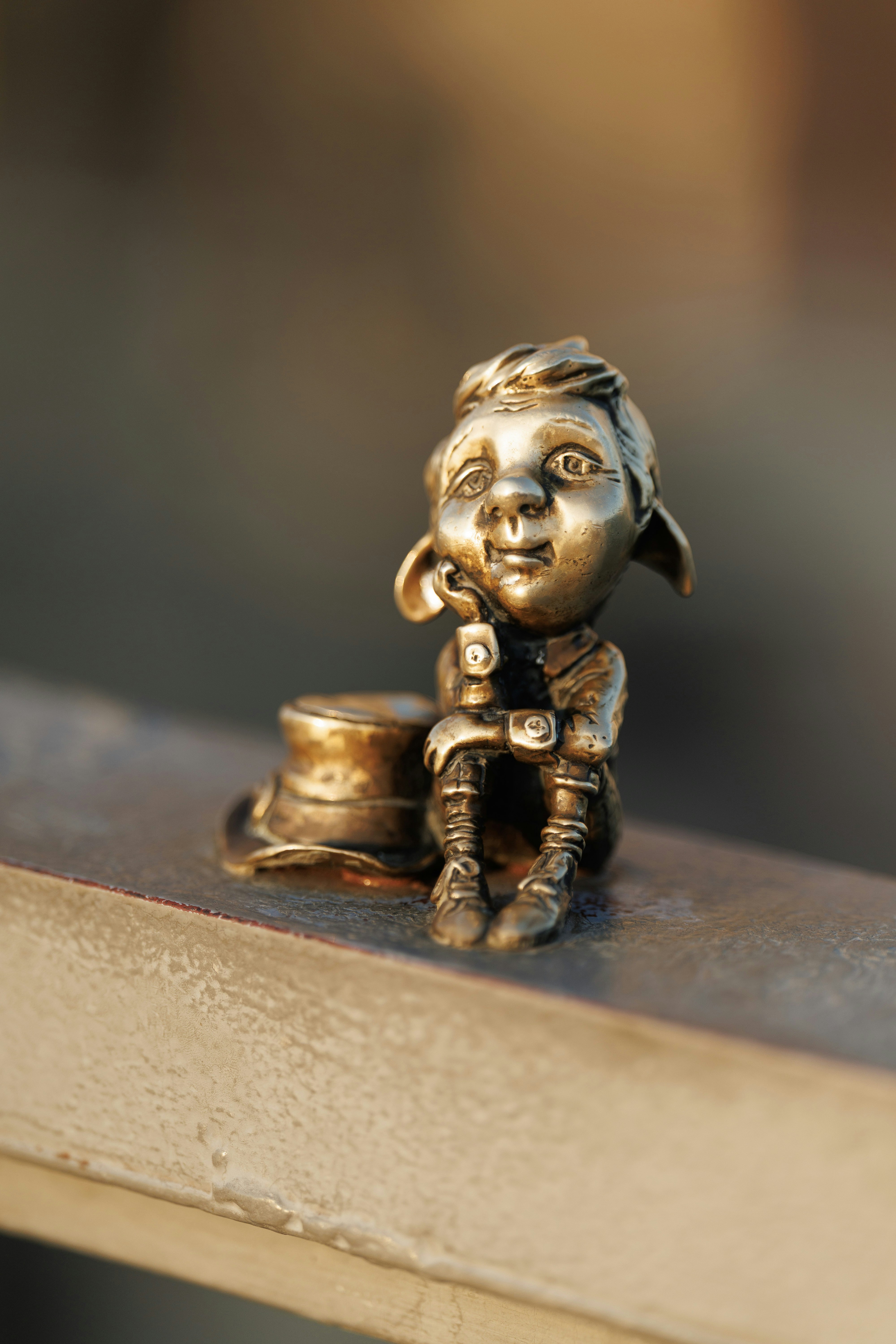 A bronze statue of a leprechaun.