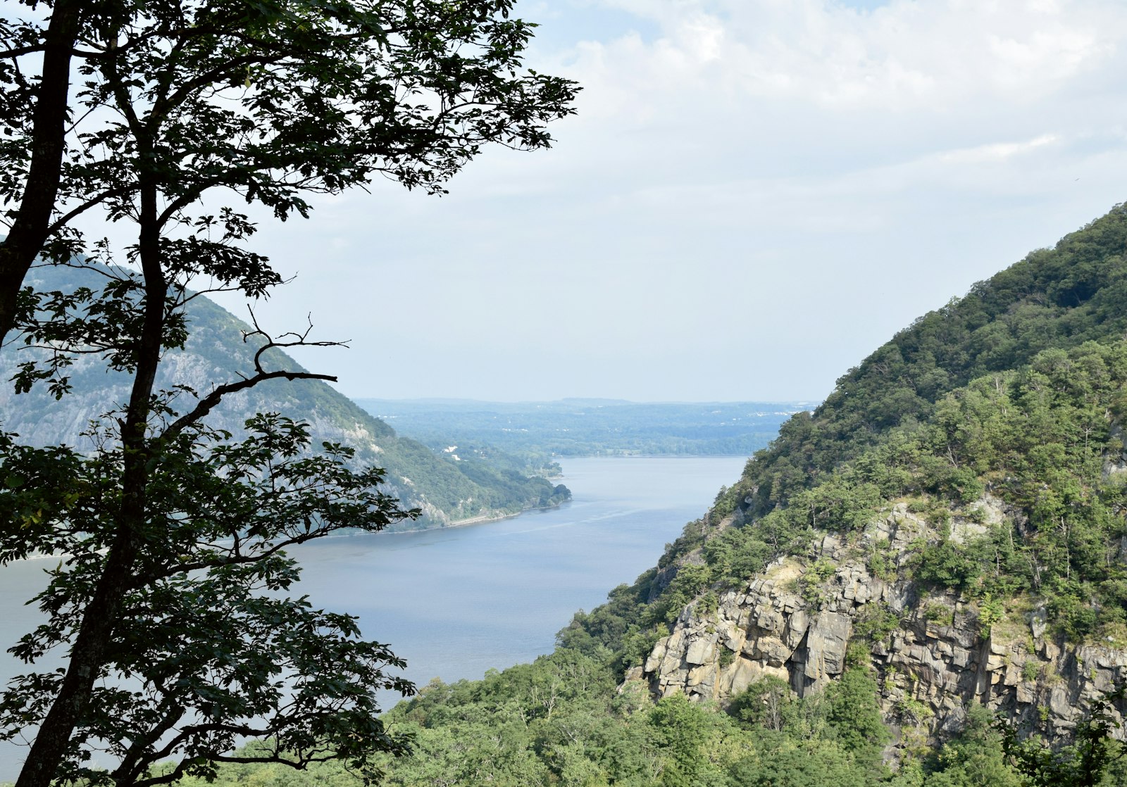 The Hudson River winding between the forested Hudson Highlands near Cold Spring, New York