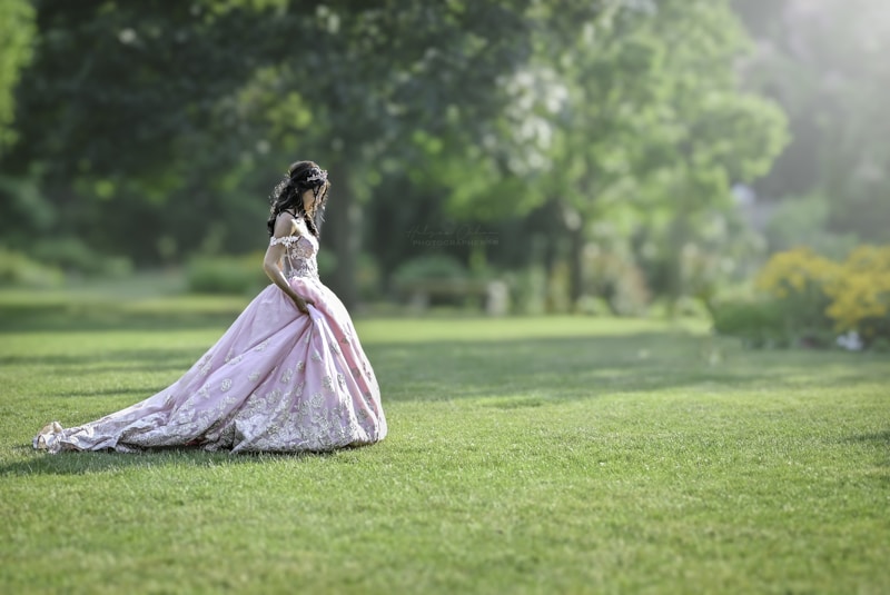 Glamorous woman strolling through meadow