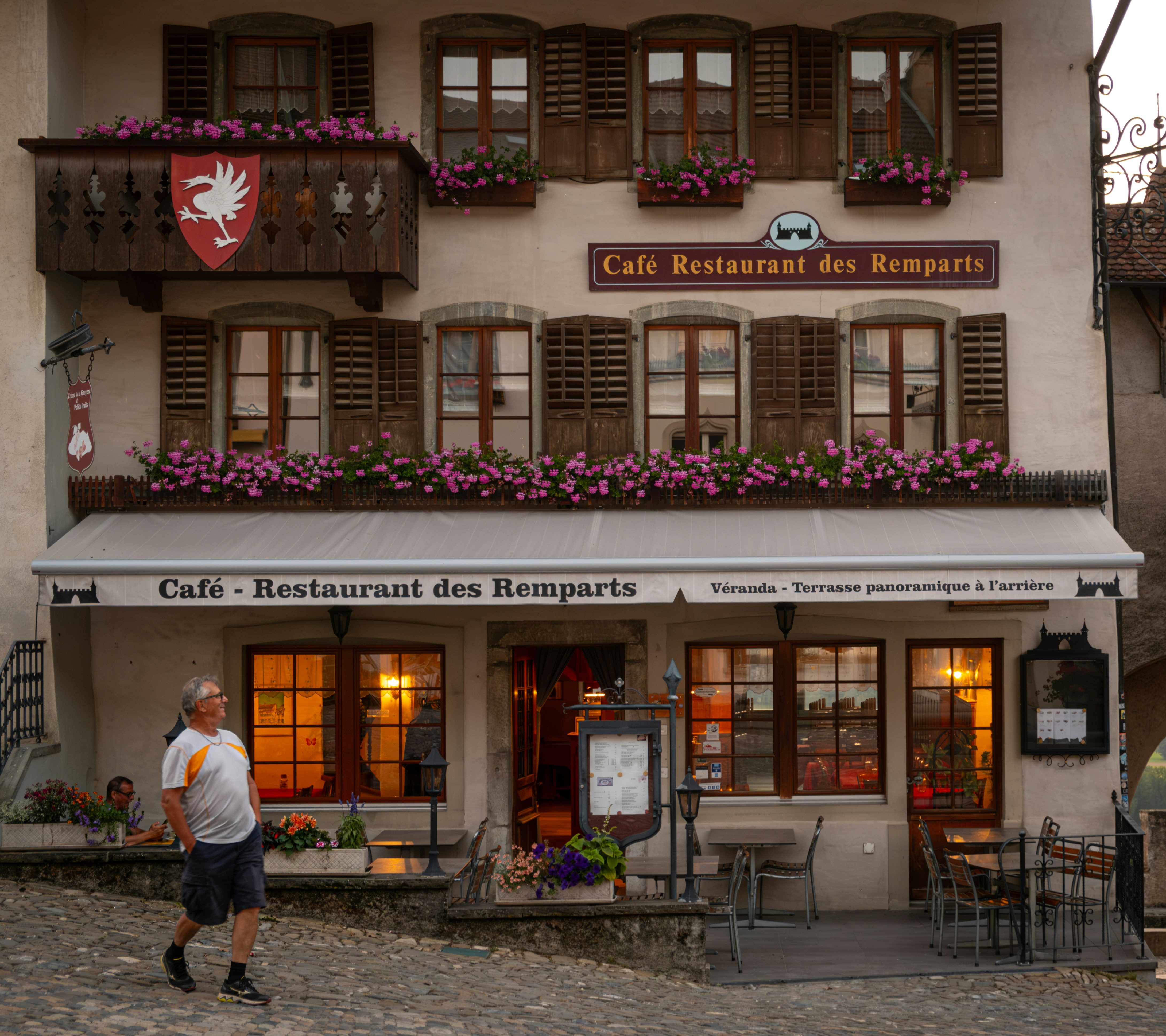 A cafe restaurant is shown in an old building.