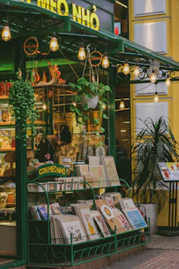 A charming shopfront with string lights and decor.