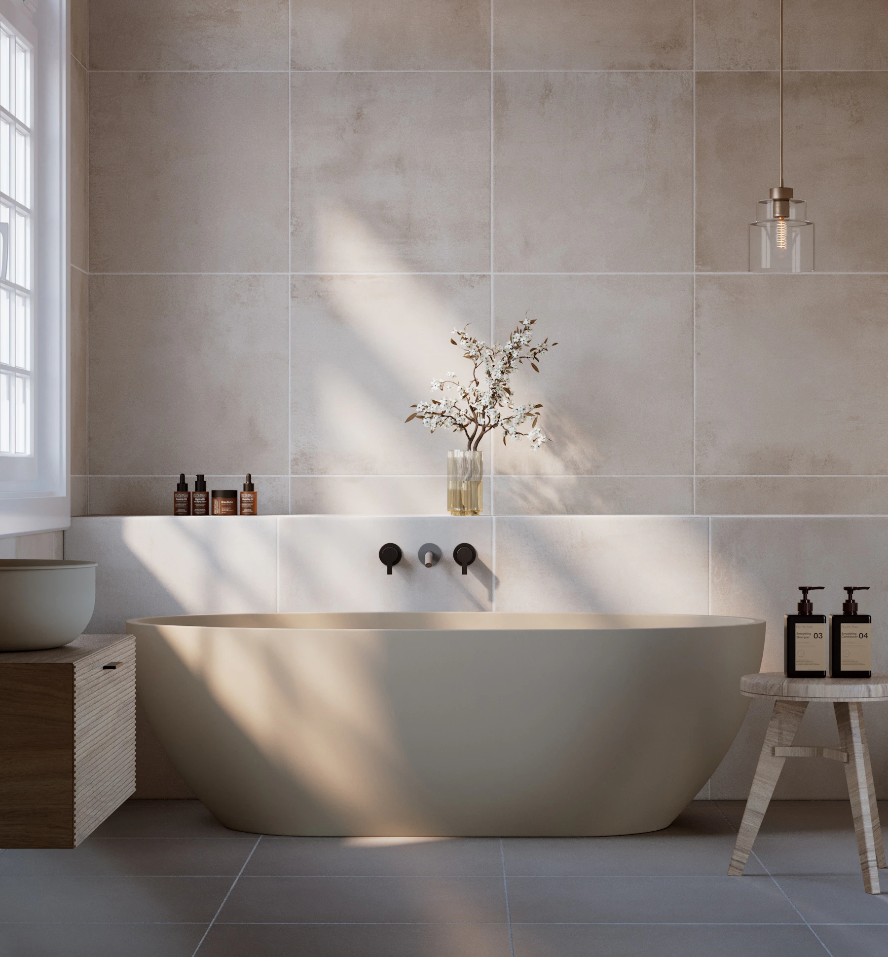 Minimal bathroom with a sculptural soaking tub in natural light