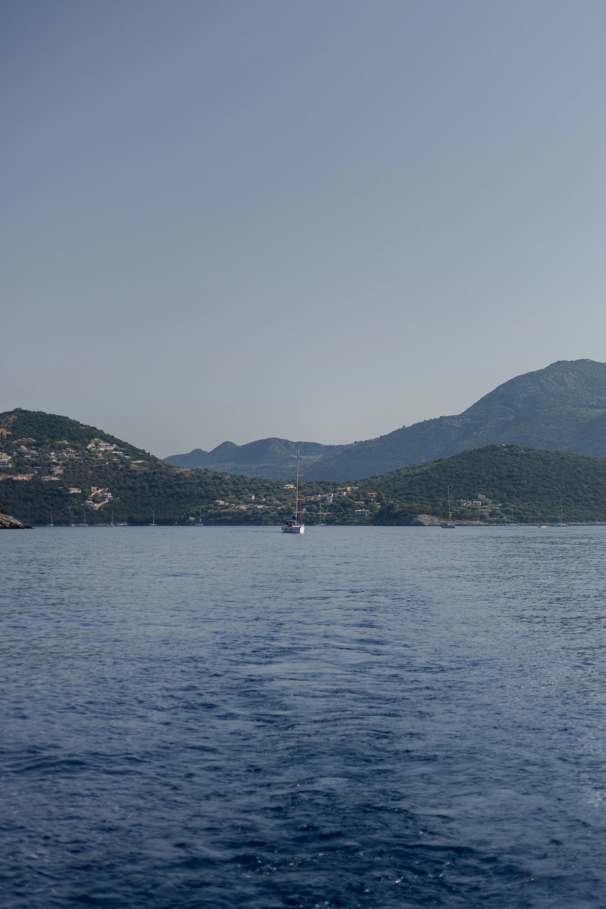 Sailing yacht on open water