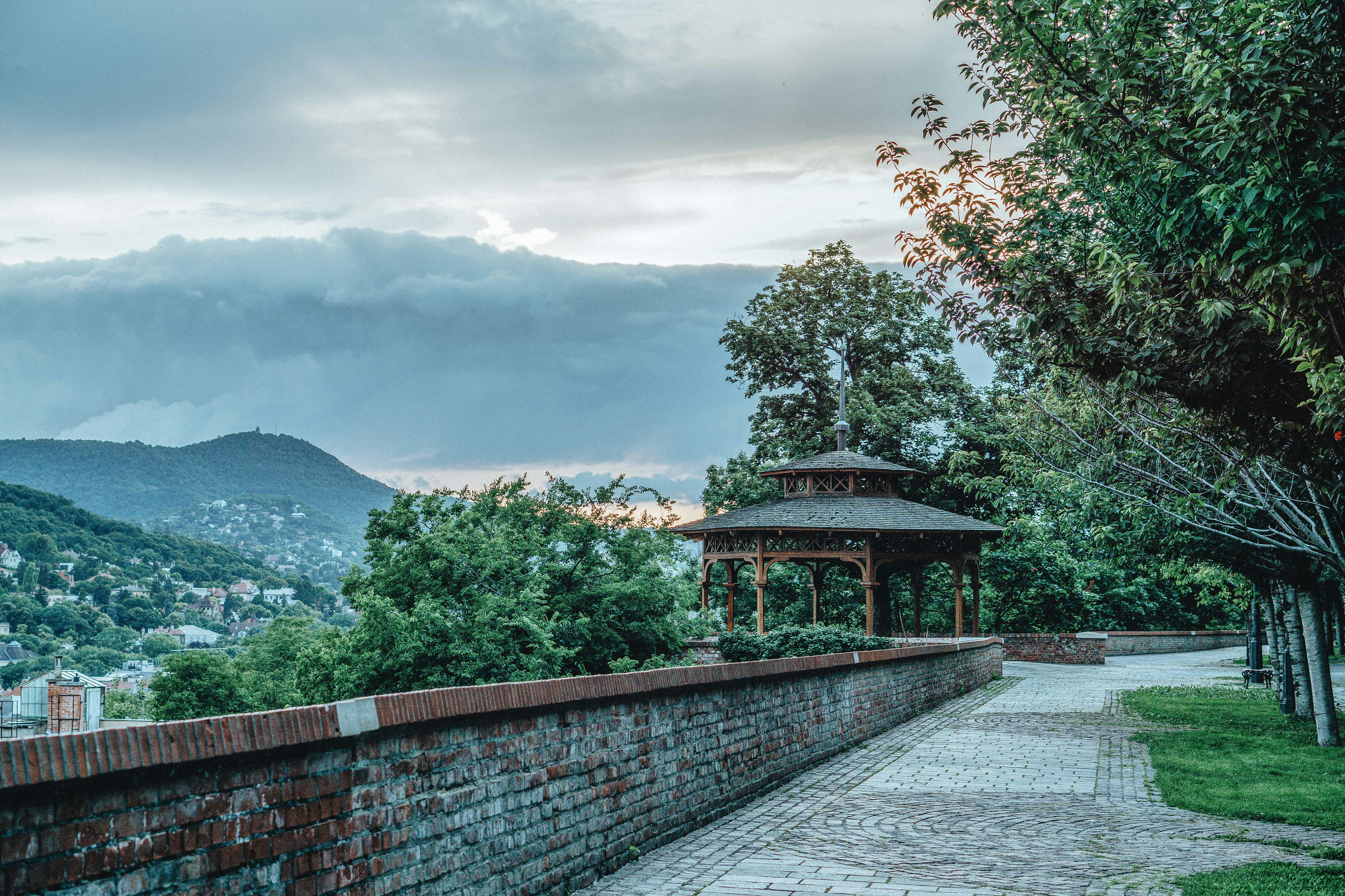 A path leads to a gazebo with a view.