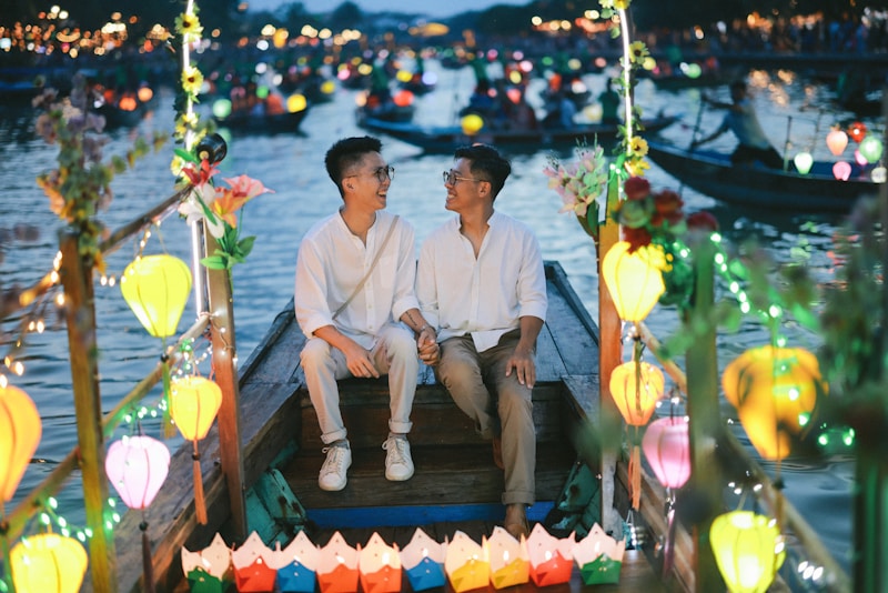 Romantic gay couple on a boat