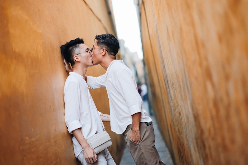 Passionate gay kiss in sunshine