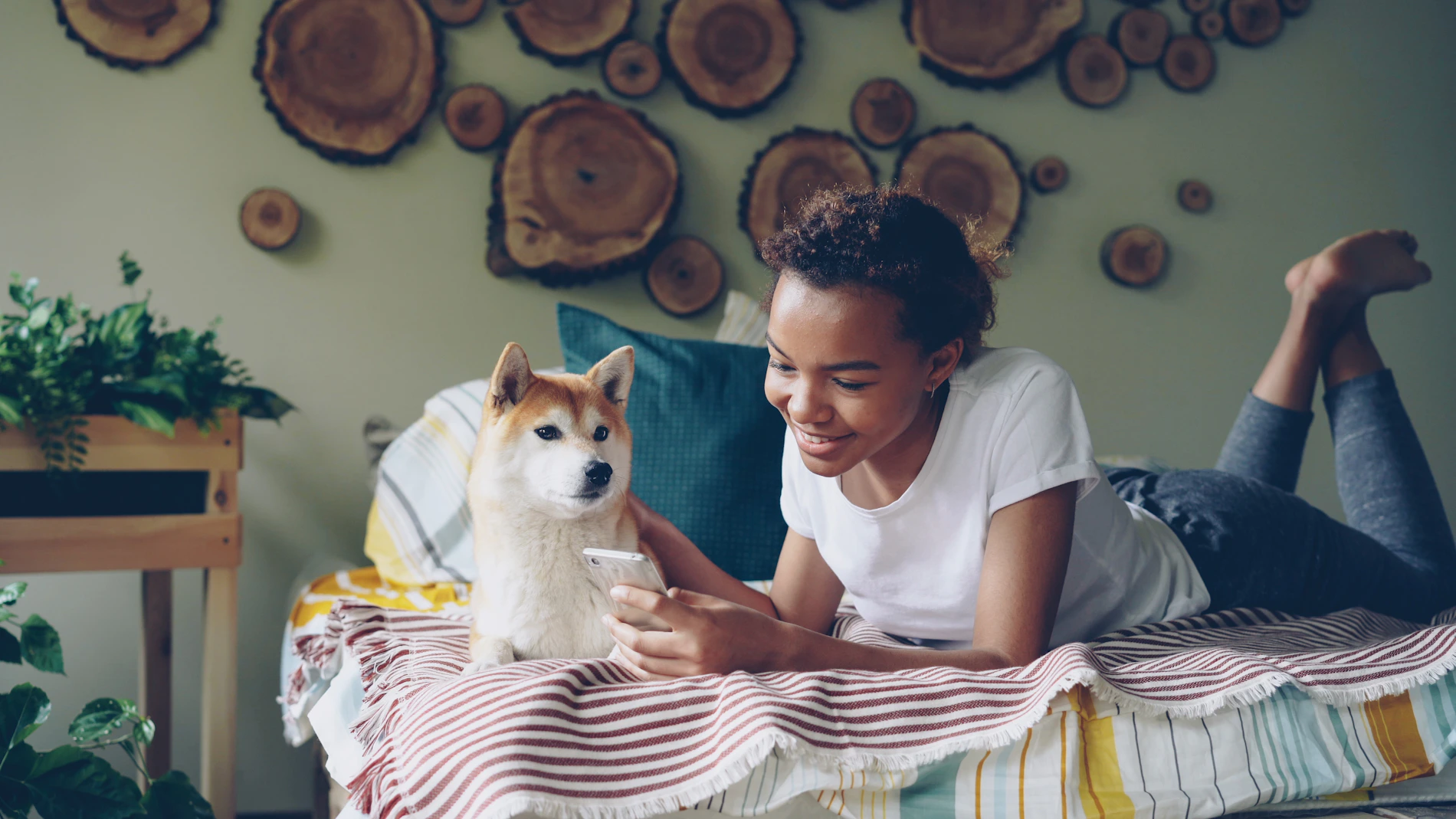 Pet owner relaxing with a dog in a contemporary home
