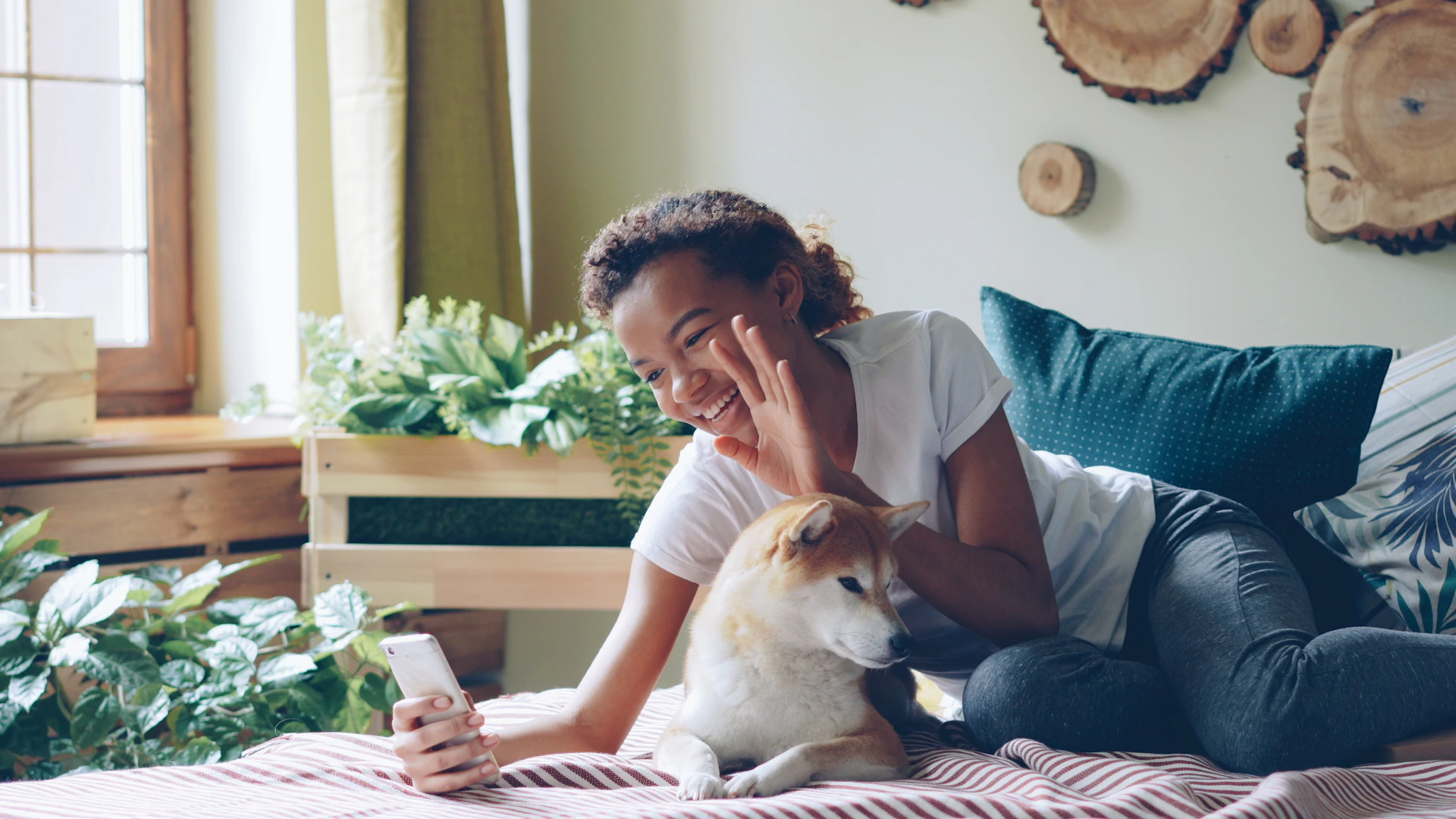 Woman takes a selfie with her dog.