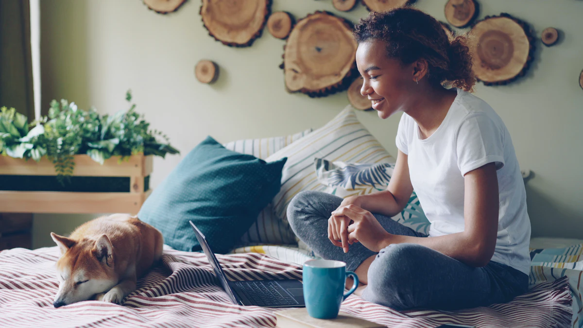 A woman relaxing with a laptop and her dog at home