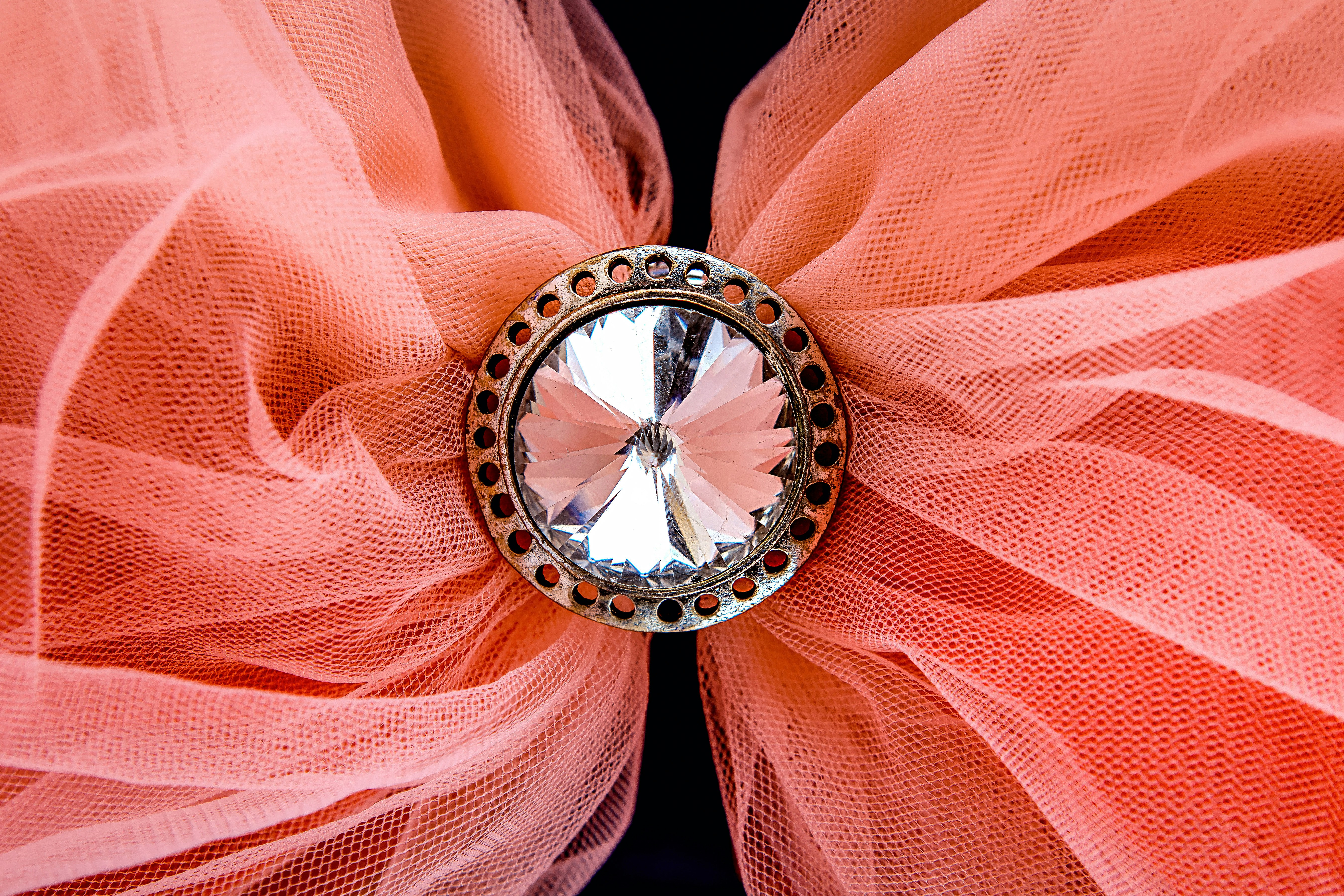 Jewel on orange fabric