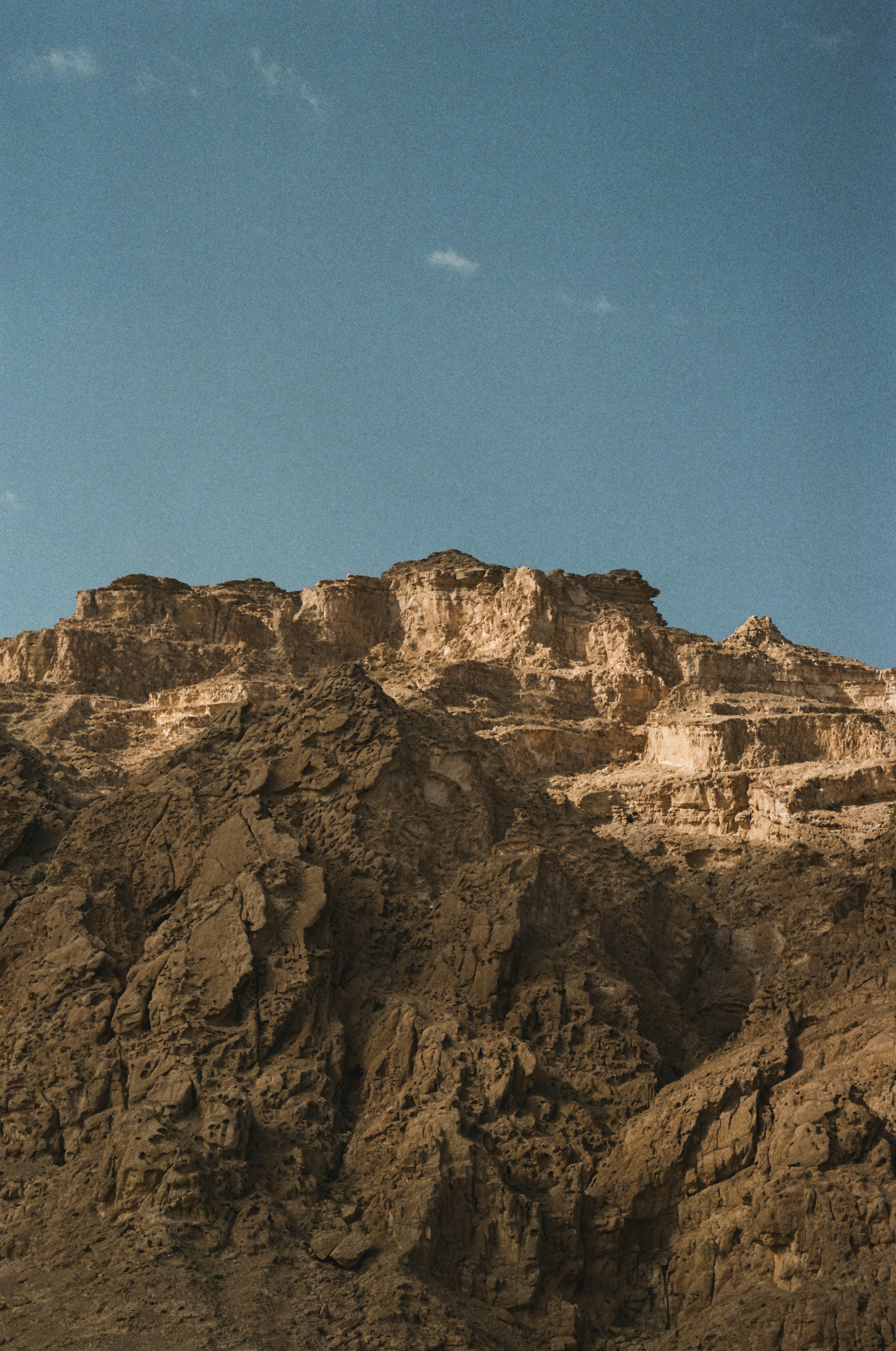 Mountains under a clear blue sky.