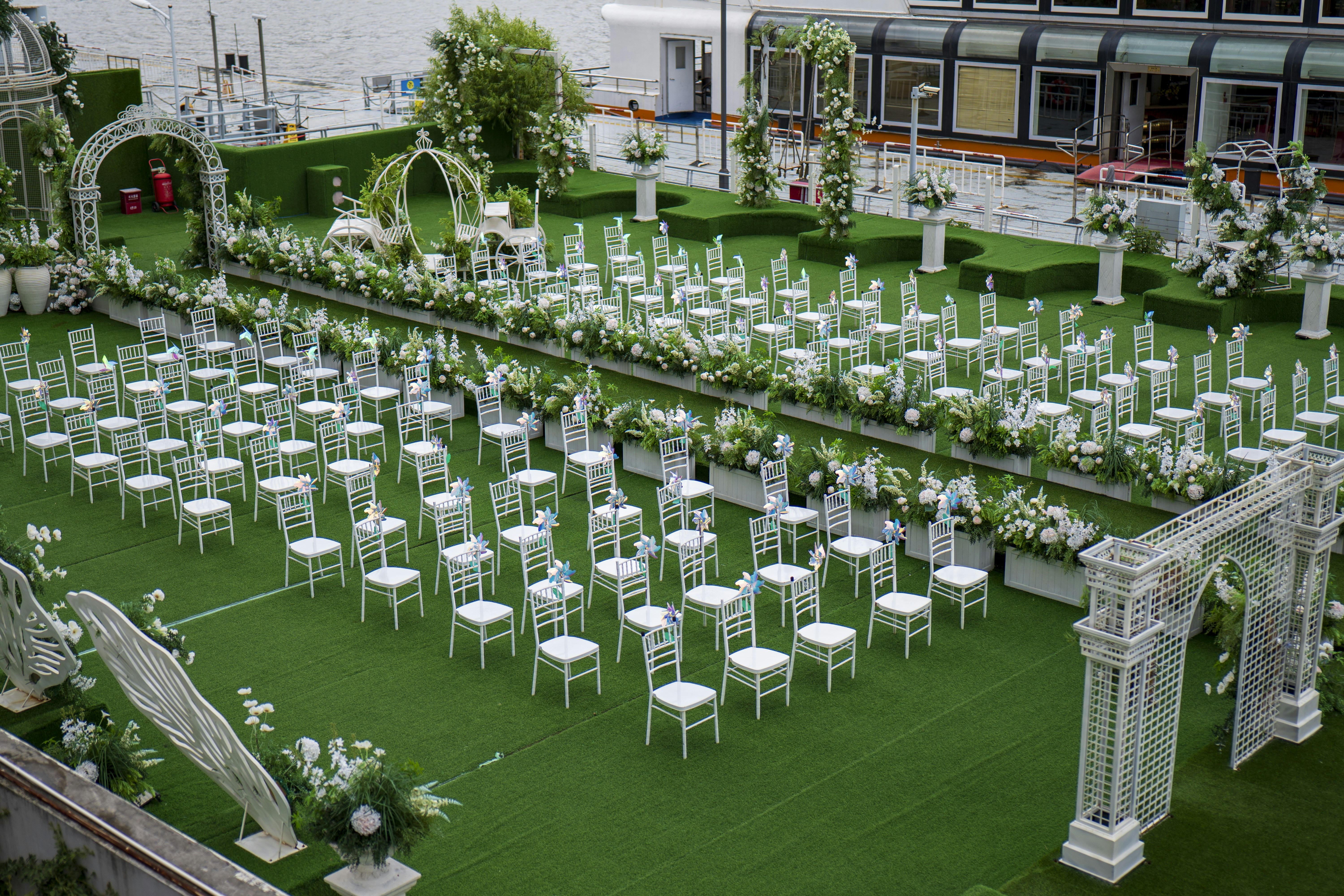 A beautiful wedding ceremony is being set up.