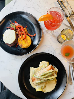 Delicious meal with drink and some appetizers.