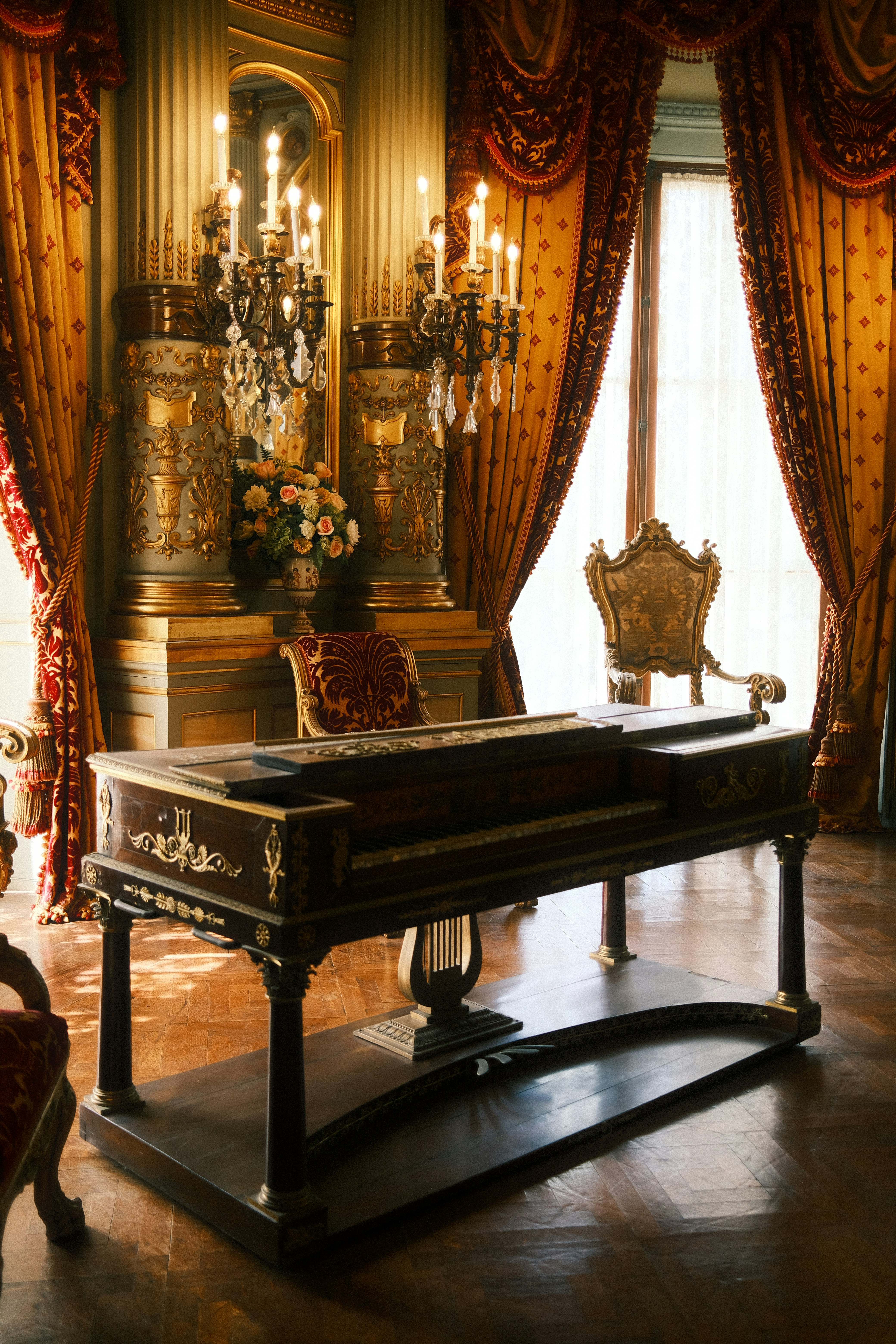 A luxurious room with an antique piano.