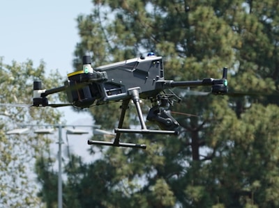 A drone flies in the sky.