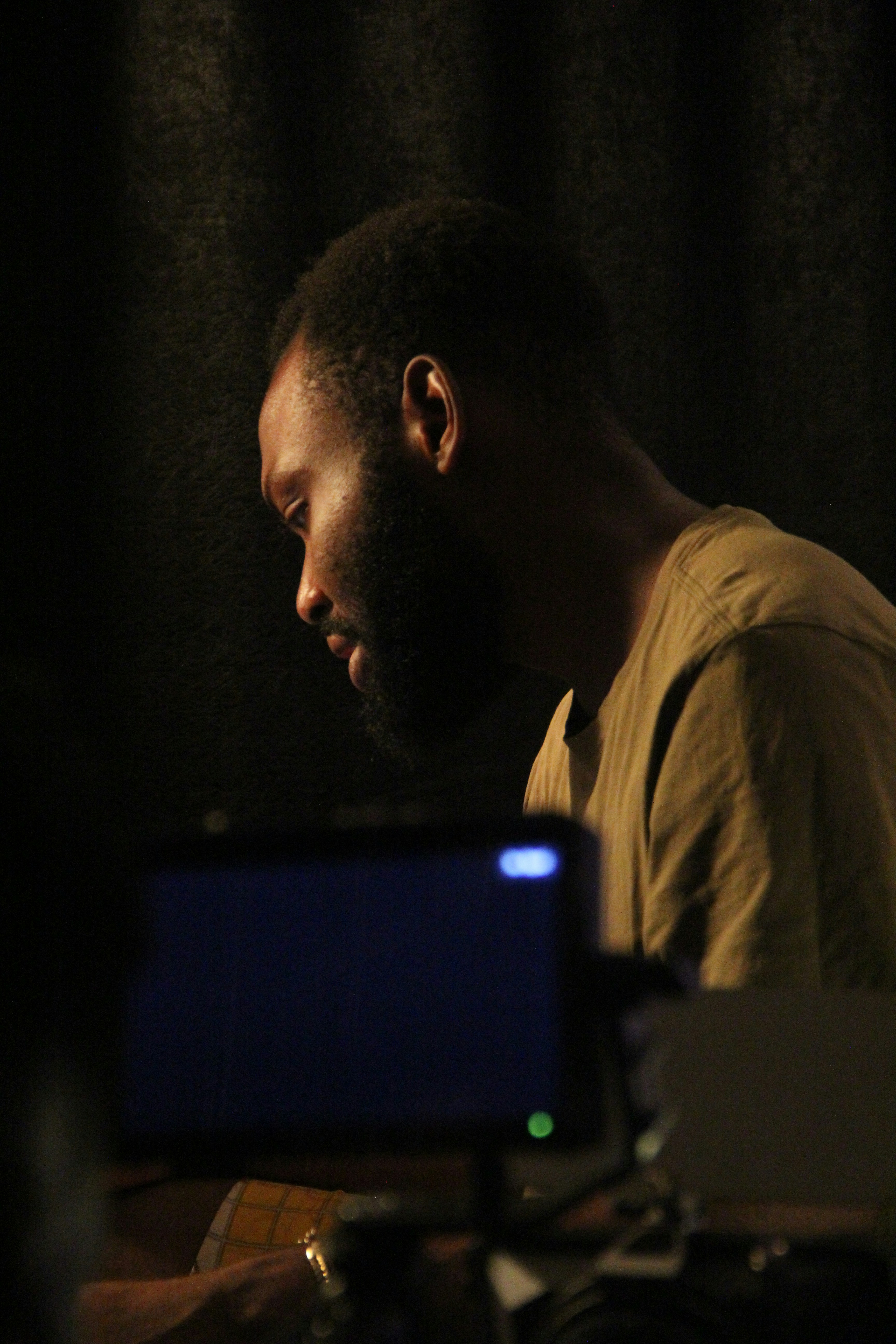 A man is focused on something out of view.