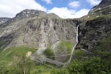 Waterfall cascades down a steep mountain.