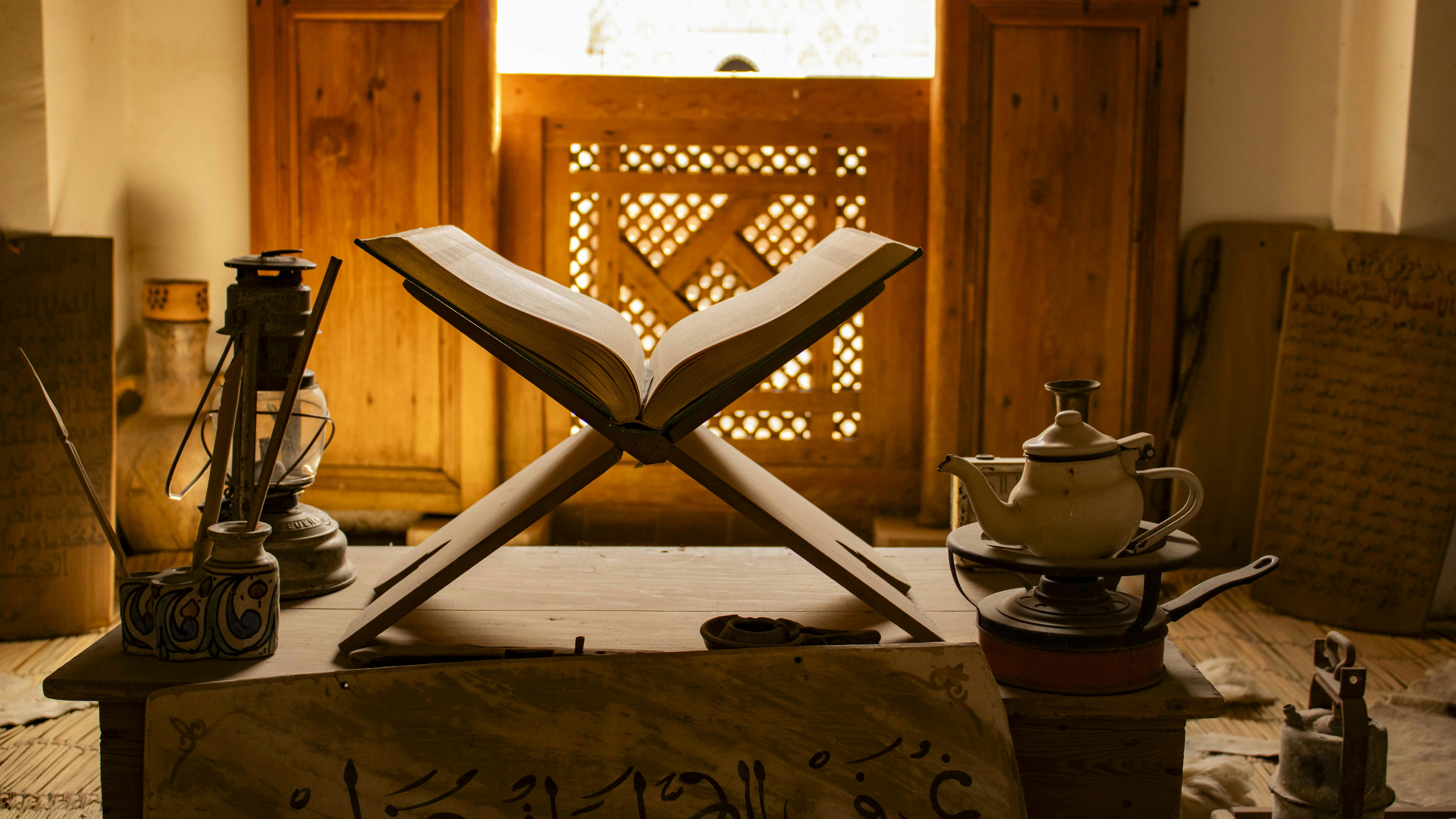 An open book sits ready for reading.