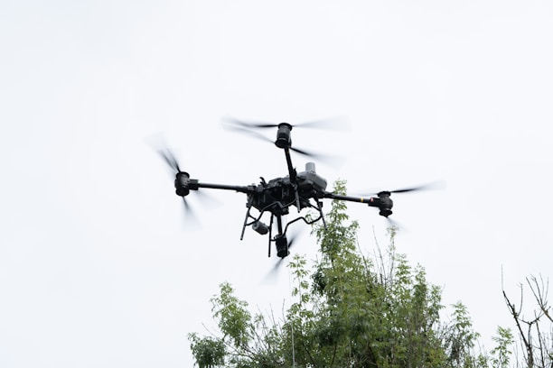 A drone flies in the sky.