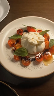 Burrata cheese with tomatoes and basil.