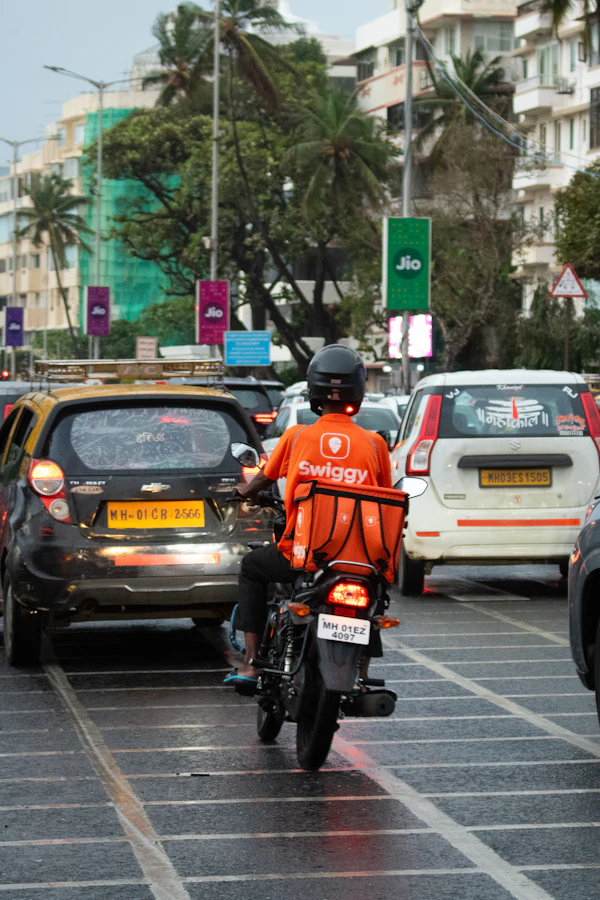 A food delivery rider navigating city traffic