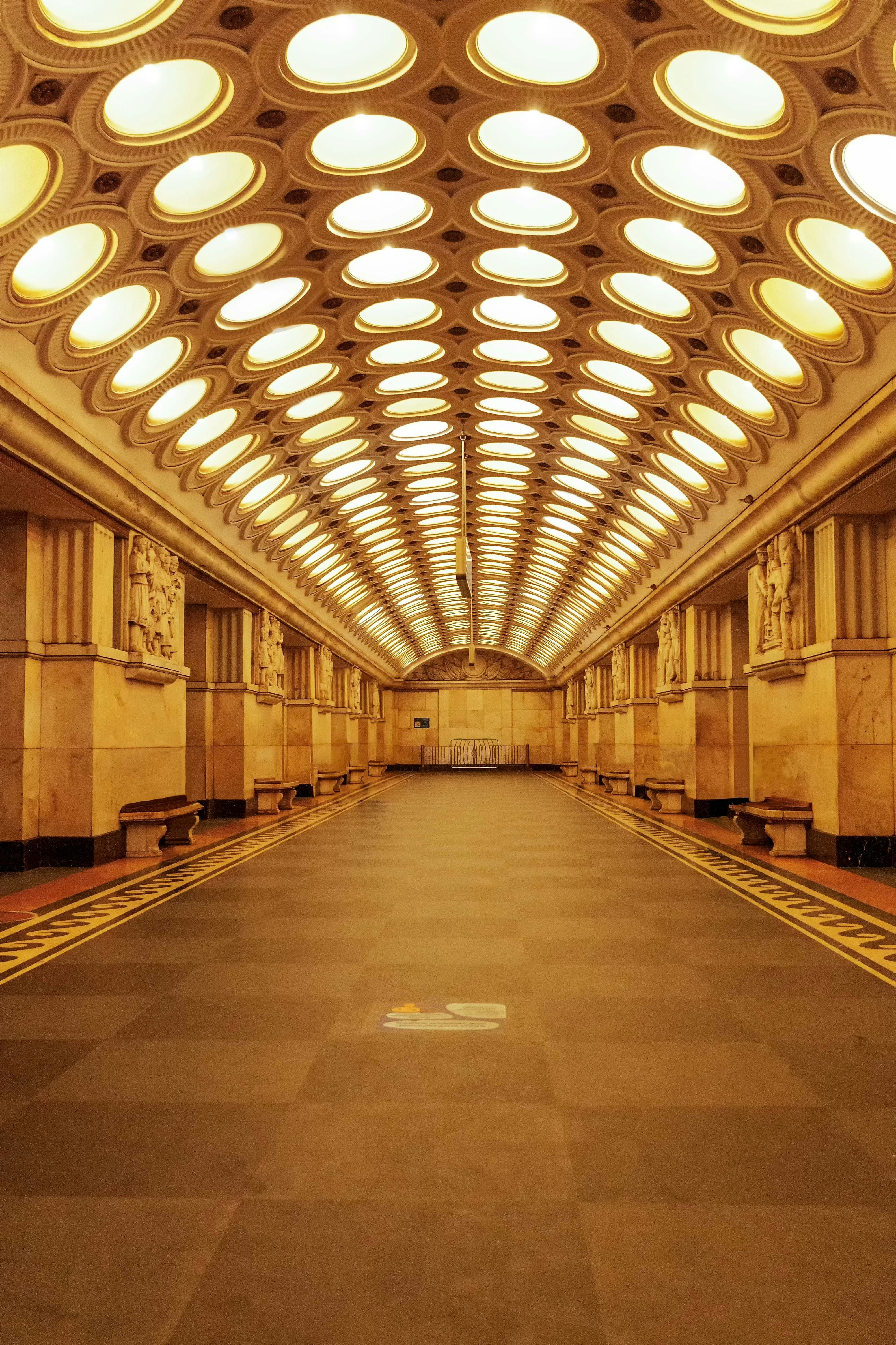 A beautifully lit subway station's interior.