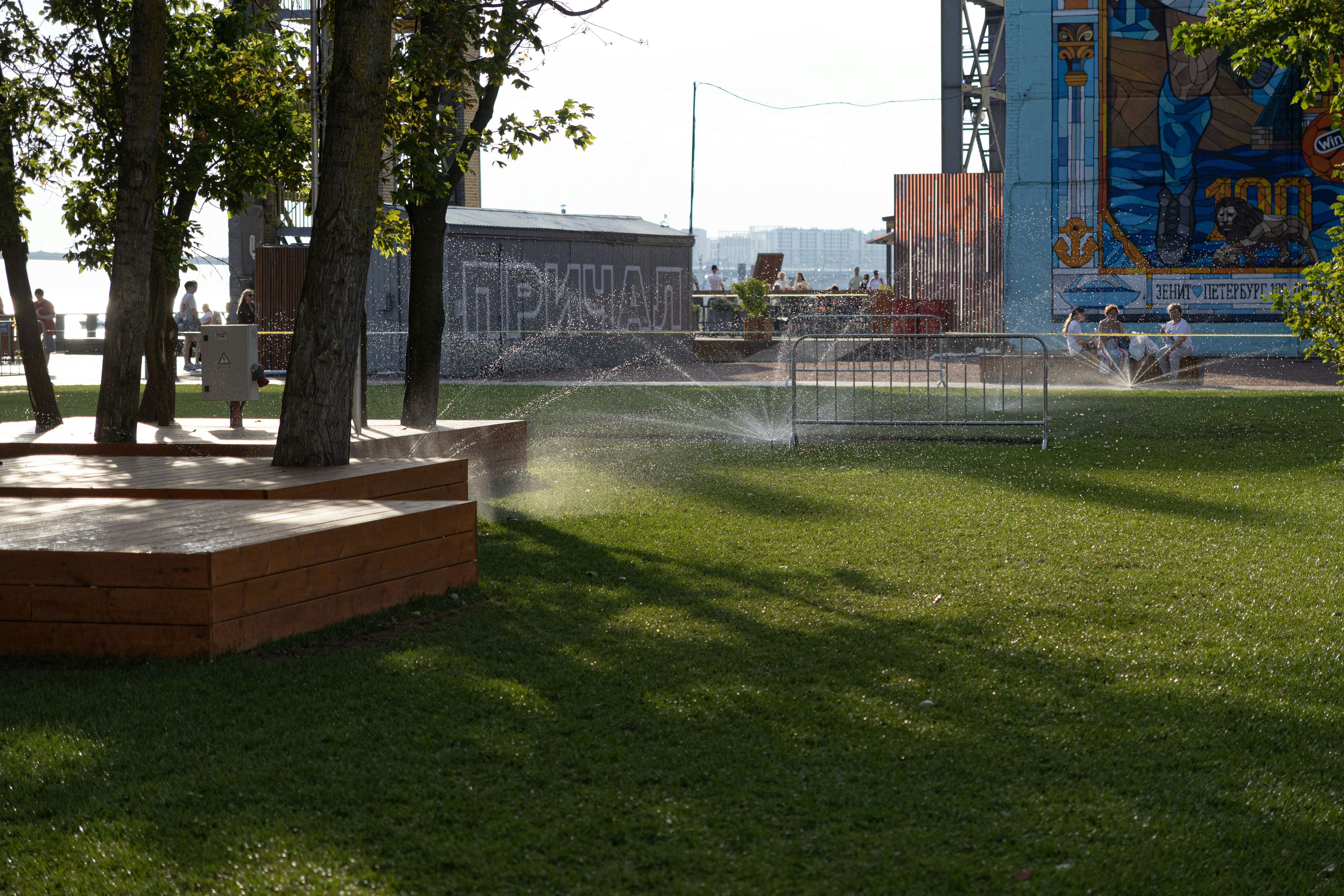 newly installed sod being watered after lawn installation