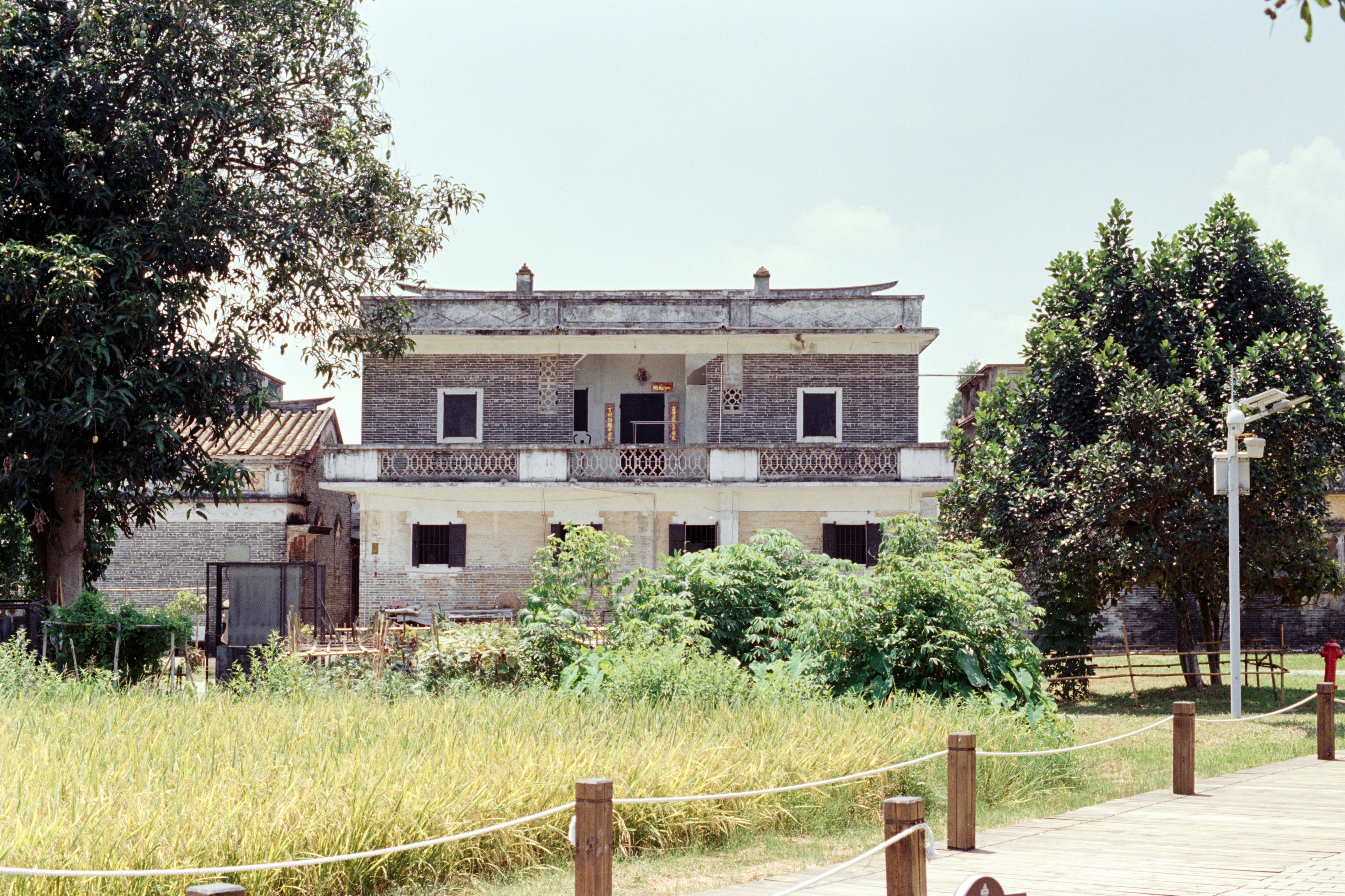 a bitcoin sitting on top of a smart phone