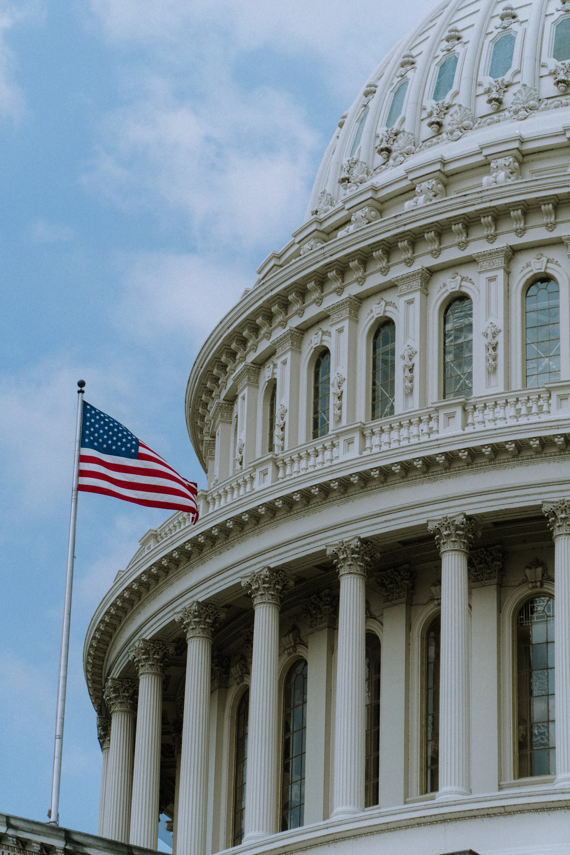 The U.S. Capitol dome with an American flag