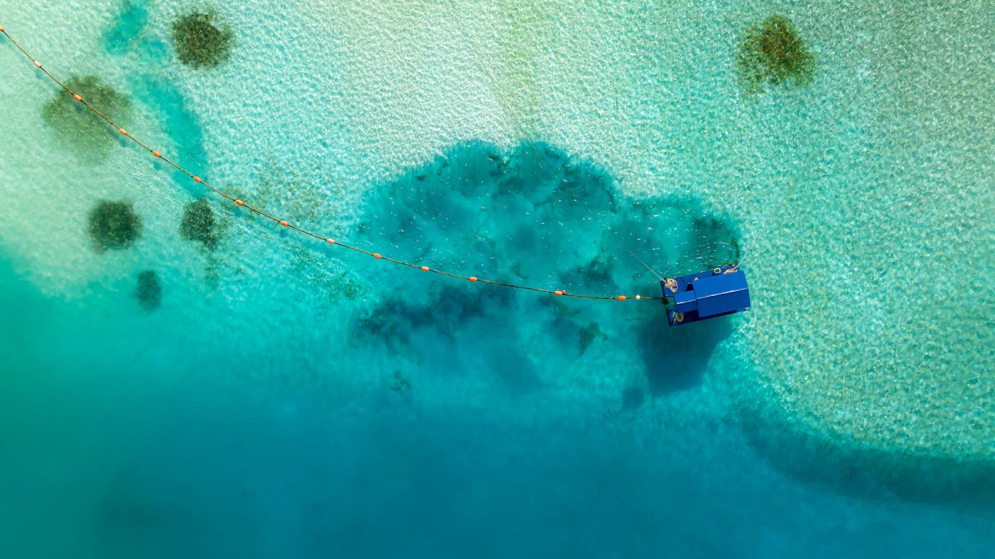 Turquoise shallows and floating structure in Kaafu Atoll, Maldives