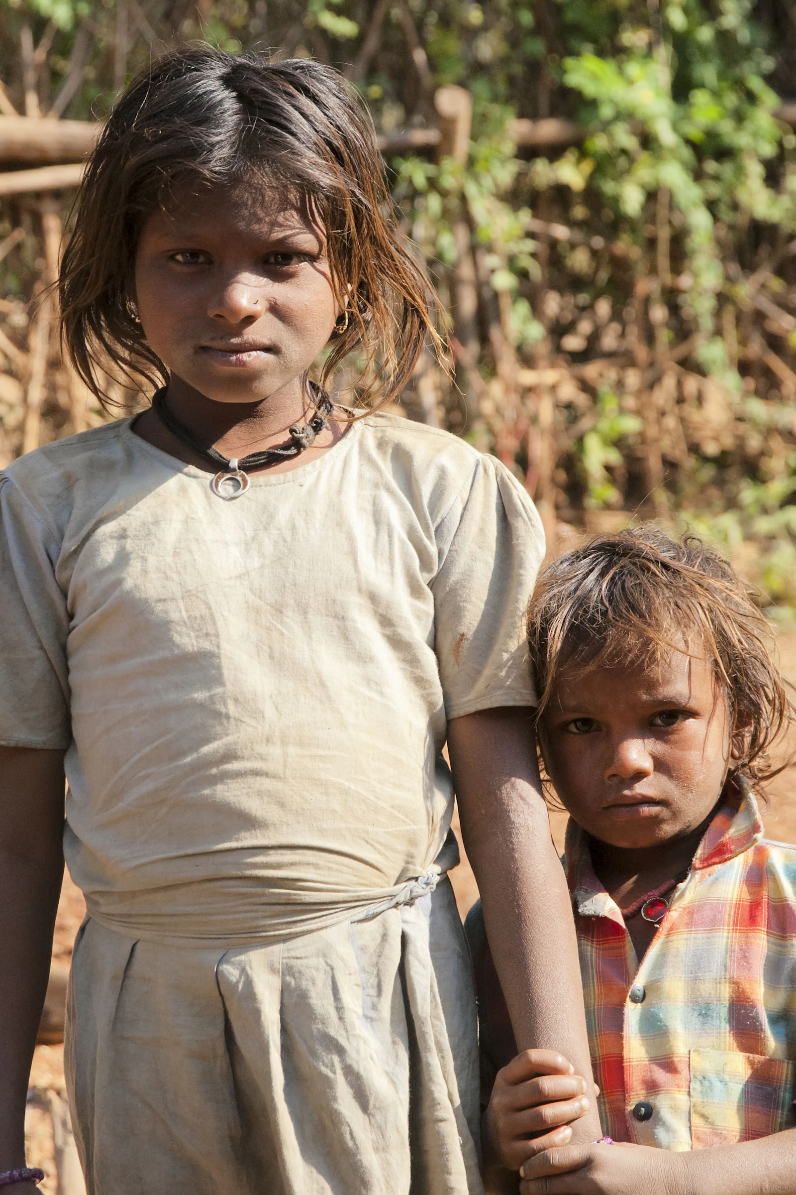 Two young girls looking towards the camera
