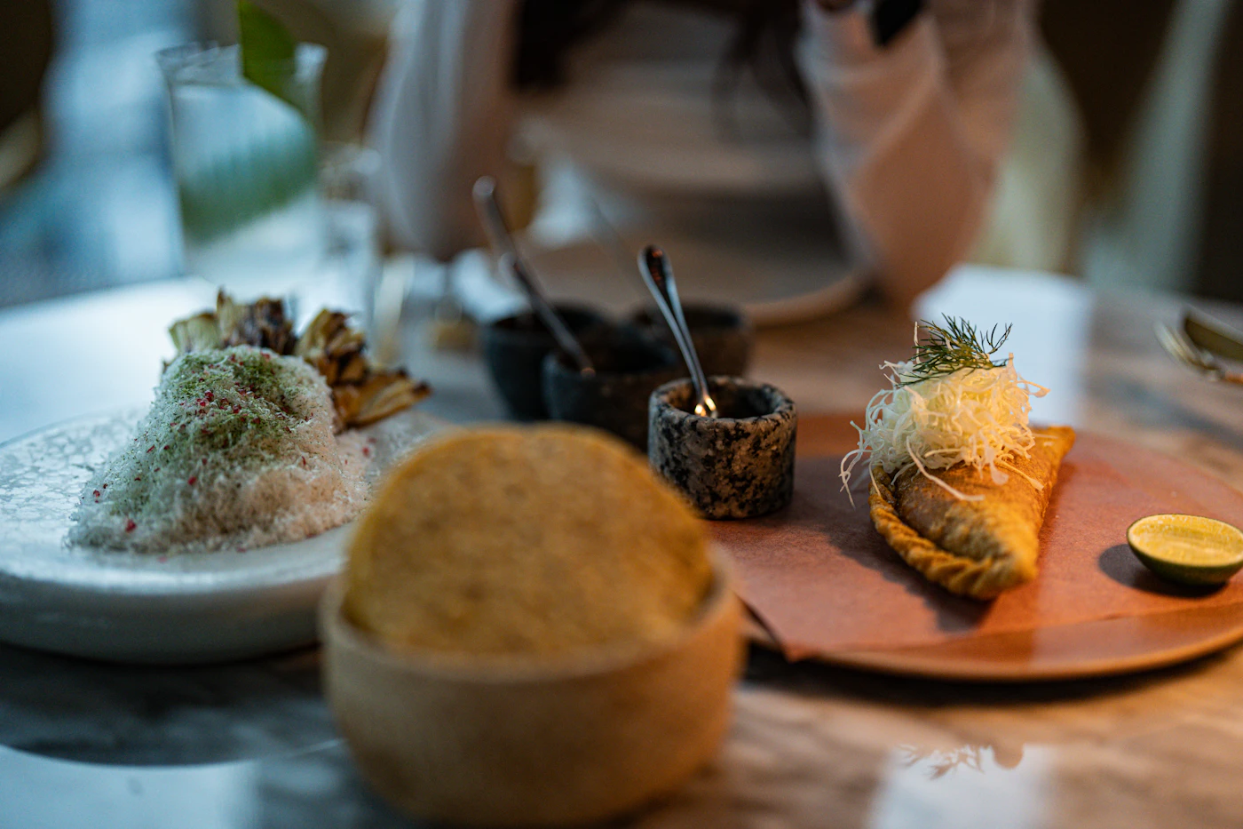 Artfully arranged restaurant dishes on a dining table